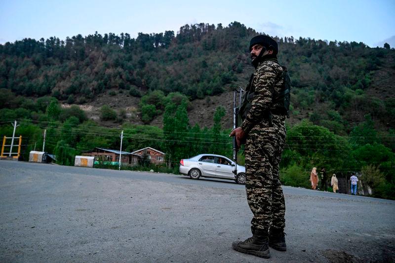 An Indian paramilitary personnel stands guard near Pahalgam, south of Srinagar, on April 22, 2025, AFPpix