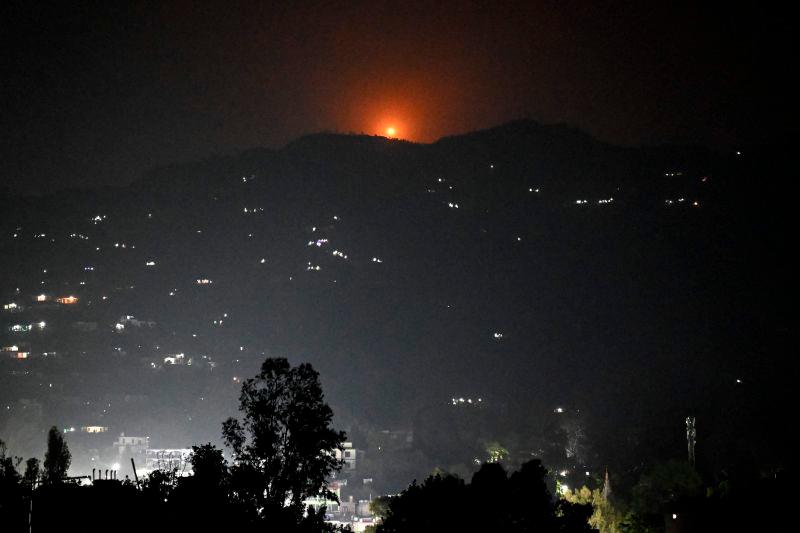 A flare goes up in air over the hill near main town of Poonch district, on May 7, 2025. AFPpix