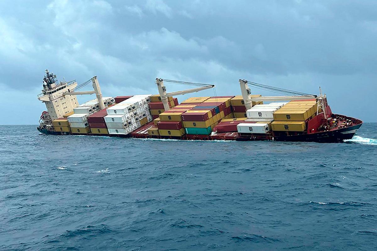 This photograph taken and released on May 25, 2025 by the Indian Defence Public Relations Office (PRO) of Mumbai shows a Liberian-flagged container ship off India's southern coast of Kerala. A Liberian-flagged container ship with hazardous cargo has sunk off India's southern coast of Kerala, the navy said May 25, after rescuing all 24 crew members safely. - AFP PHOTO /Indian Defence Public Relations Office (PRO) of Mumbai - / HANDOUT