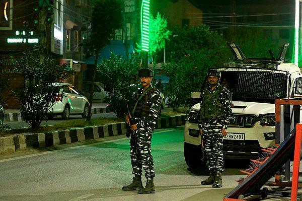 Indian security personnel stand guard outside a police headquarter in Srinagar on September 13, 2023, AFPPIX