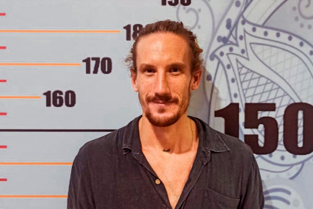 This handout photo taken on April 25, 2022 and released on April 26 by the Bali Immigration Office shows Canadian tourist Jeffrey Craigen detained by immigration authorities in Denpasar, on Indonesia’s resort island of Bali. AFPPIX