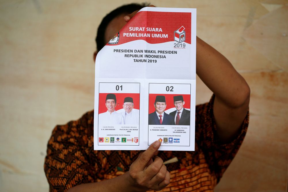 A person holds up a voting ballot during the counting of the Indonesian elections results in Jakarta, Indonesia April 17, 2019. — Reuters