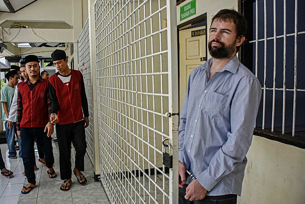 Frenchman Felix Dorfin waits for his trial to start in Mararam on the resort island of Lombok on May 20, 2019. - AFP