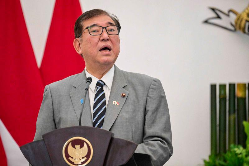 Japan's Prime Minister Shigeru Ishiba and Indonesia's President Prabowo Subianto (not pictured) give a press statement following their meeting at the presidential palace in Bogor, West Java, on January 11, 2025. - AFPPIX