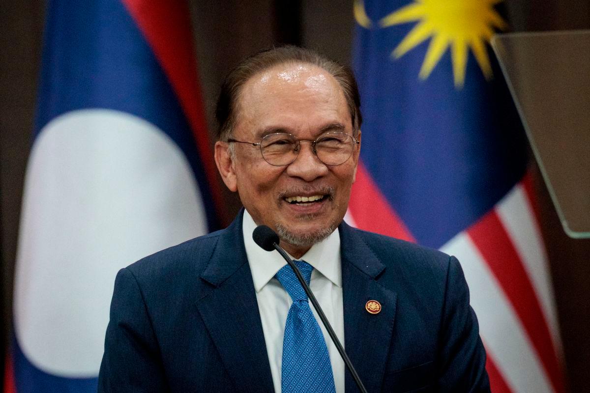 Prime Minister Anwar Ibrahim delivers a speech at the Association of Southeast Asian Nations (ASEAN) Secretariat in Jakarta on July 29, 2025. (Photo by YASUYOSHI CHIBA / AFP)
