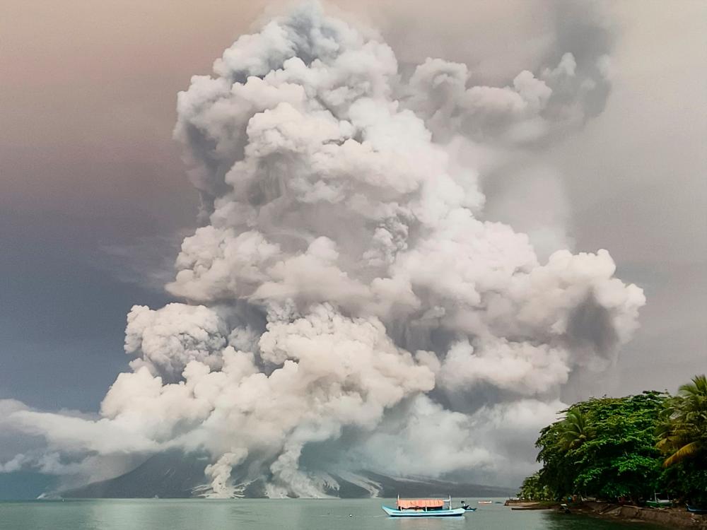 An eruption from Mount Ruang volcano is seen from Tagulandang island in Sitaro, North Sulawesi, on April 30, 2024/AFPPix