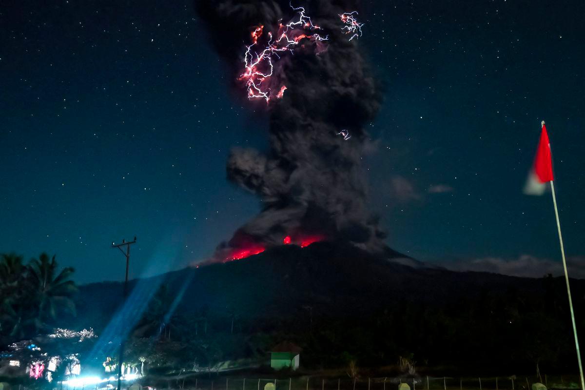 This handout photo taken and released on August 1, 2025 by Indonesia's Geological Agency shows Mount Lewotobi Laki-Laki spewing lava and volcanic ash up to approximately 10 kilometres high during its eruption as observed from the monitoring post in East Flores, in East Nusa Tenggara province. - AFPPIX/ INDONESIA'S GEOLOGICAL AGENCY