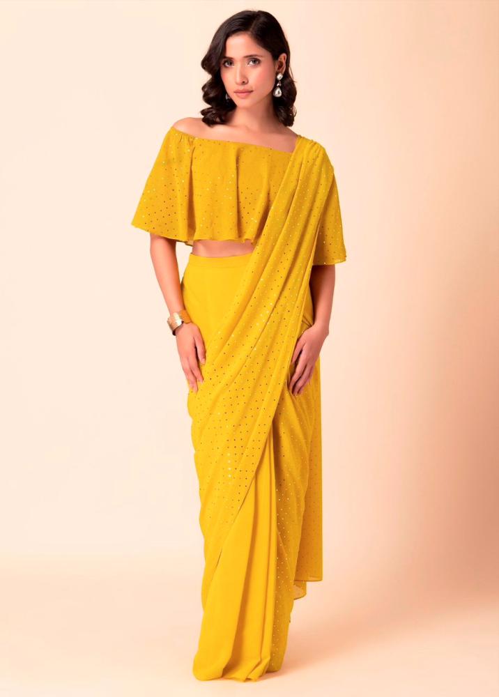 $!A canary yellow ready-made saree with an off-shoulder top.