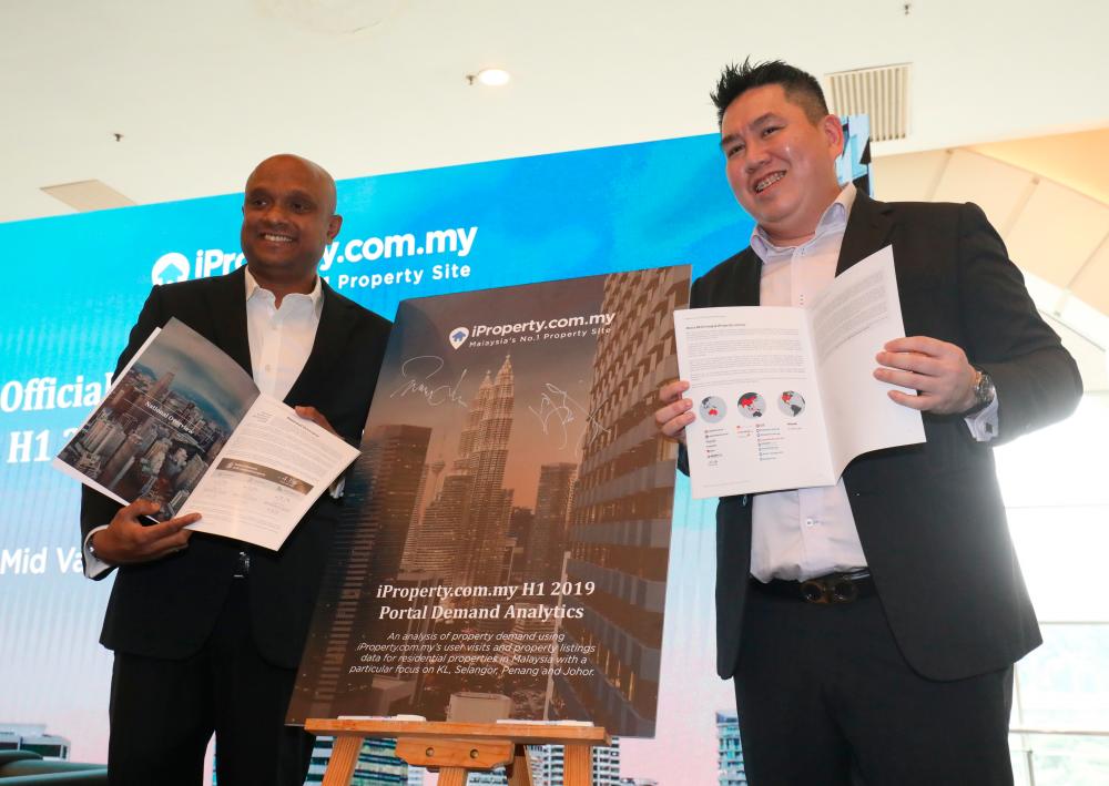 Premendran (left) and general manager of agent and developer sales Sean Liew at the launch of iProperty.com’s 1H 2019 Portal Demand Analytics