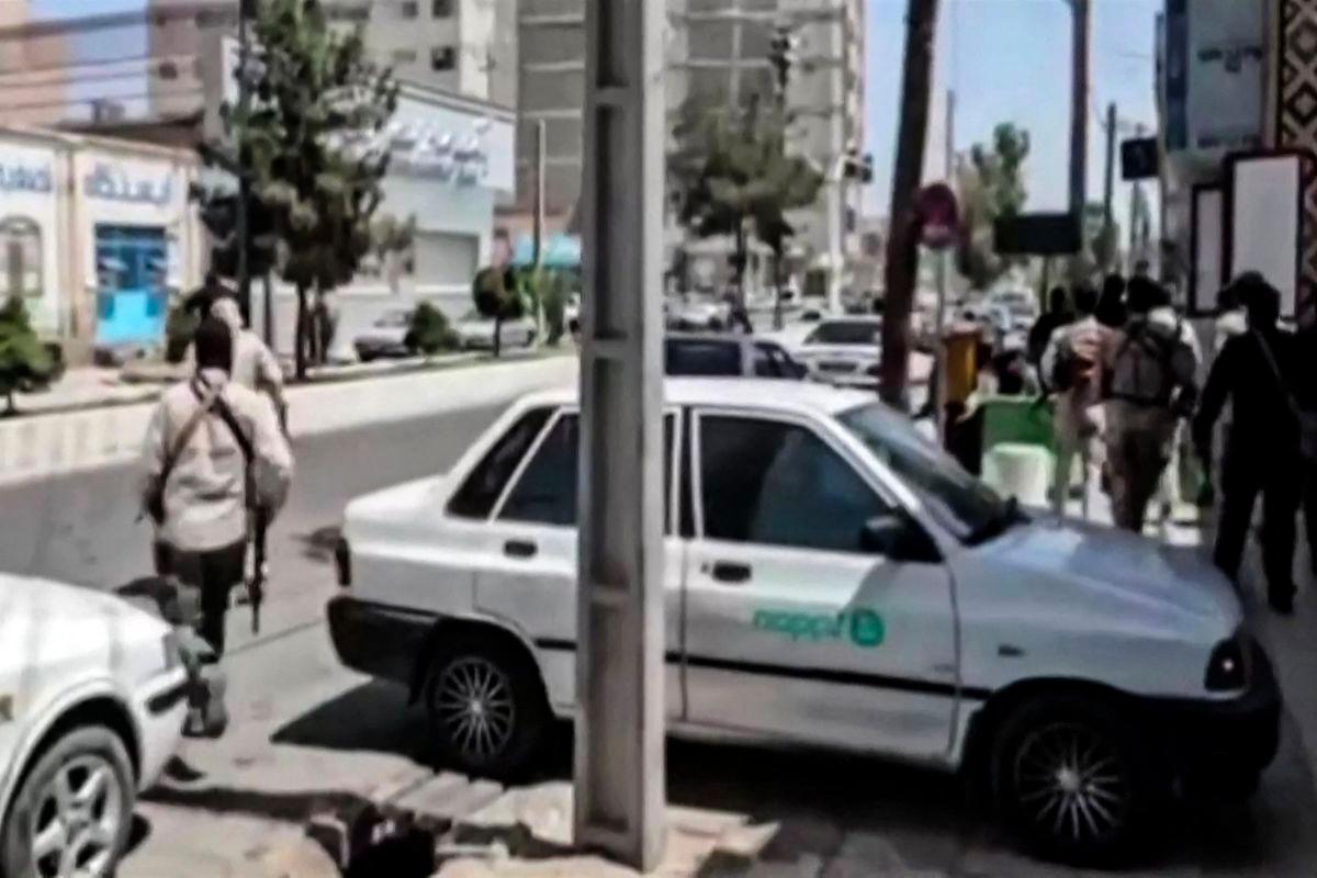 This image grab from a handout video provided by the Iranian judiciary's news agency Mizan Online on July 26, 2025, shows clashes in front of a judiciary building in Zahedan, the capital of southeastern Sistan-Baluchistan province. - AFPPIX via MIZAN NEWS AGENCY