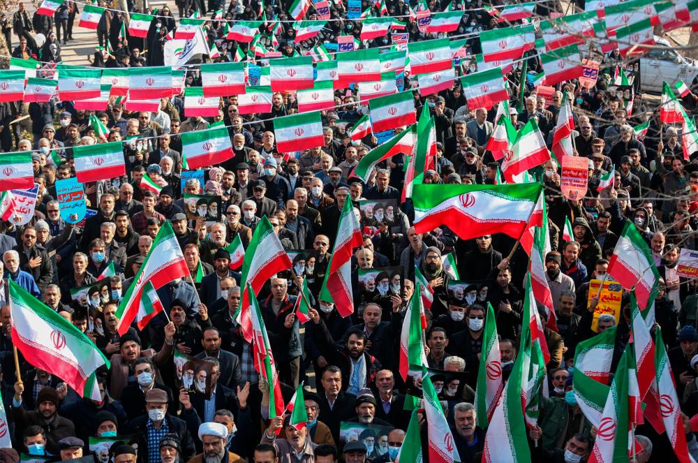 Iranians take part in a pro-government rally in the central city of Hamedan, on December 30, 2022. AFPPIX