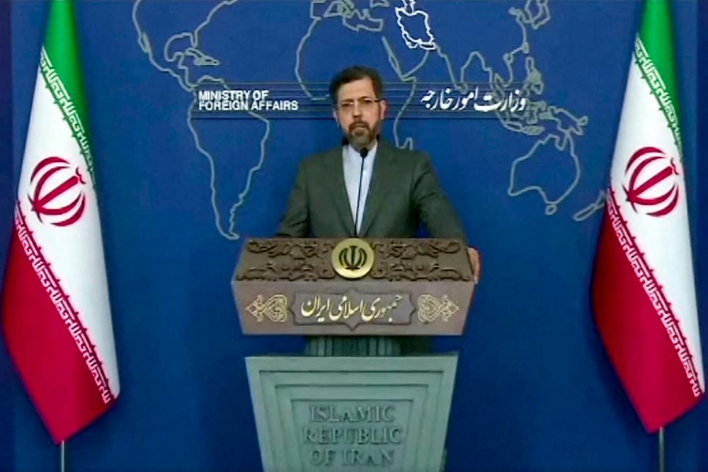 An image grab from a video released by state-run Iran Press news agency on May 31, 2022 shows Iran’s Foreign Ministry Spokesman Saeed Khatibzadeh briefing reporters in Tehran. Iran on May 31 said that a report by the UN nuclear watchdog on undeclared nuclear material found at three sites was “not fair”. AFPPIX