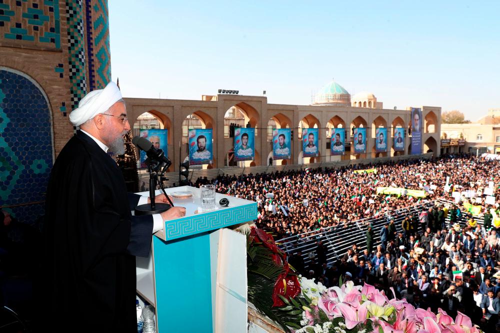 A handout picture provided by the Iranian presidency on November 10, 2019 shows president Hassan Rouhani delivering a speech to a crowd in the central city of Yazd. - AFP