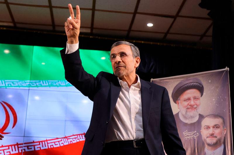 Former Iranian president Mahmoud Ahmadinejad flashes the V-sign for victory after registering his candidacy for Iran’s upcoming presidential election - AFPpix