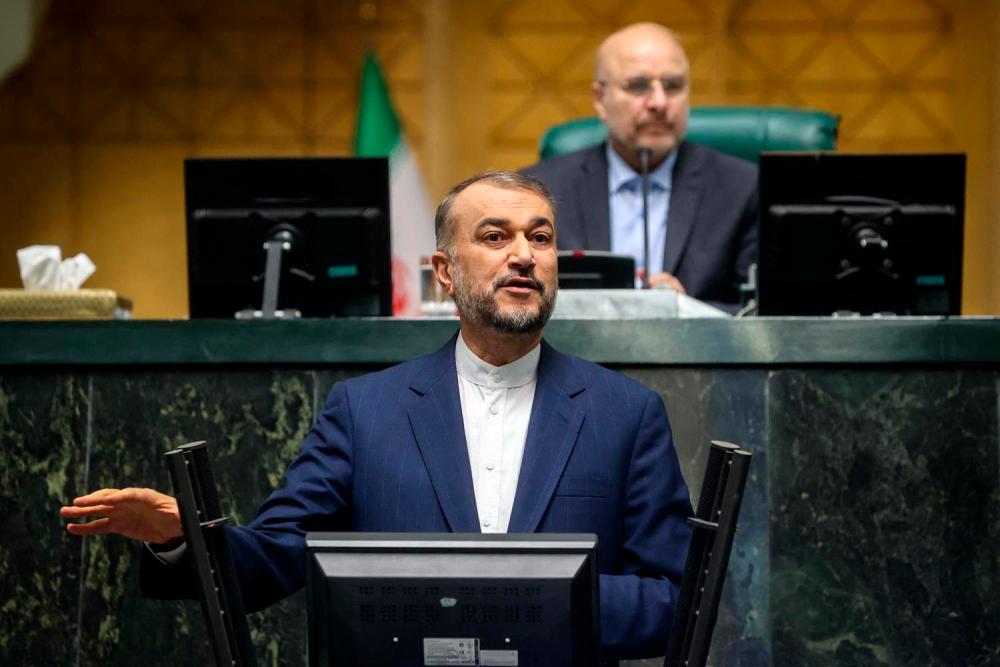 A handout picture provided by the Islamic Consultative Assembly News Agency (ICANA) on January 22, 2023, shows Iran’s Foreign Minister Hossein Amir-Abdollahian, addressing the parliament in the capital Tehran. AFPPIX
