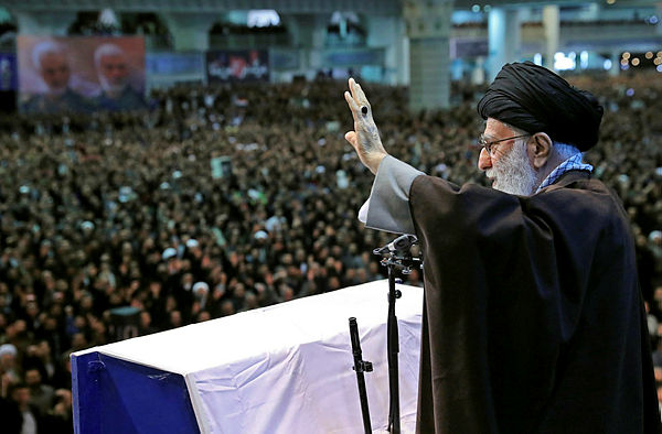 A handout picture provided by the office of Iran’s Supreme Leader Ayatollah Ali Khamenei on Jan 17 shows him delivering a sermon to the crowd during Friday prayers in the capital Tehran. — AFP