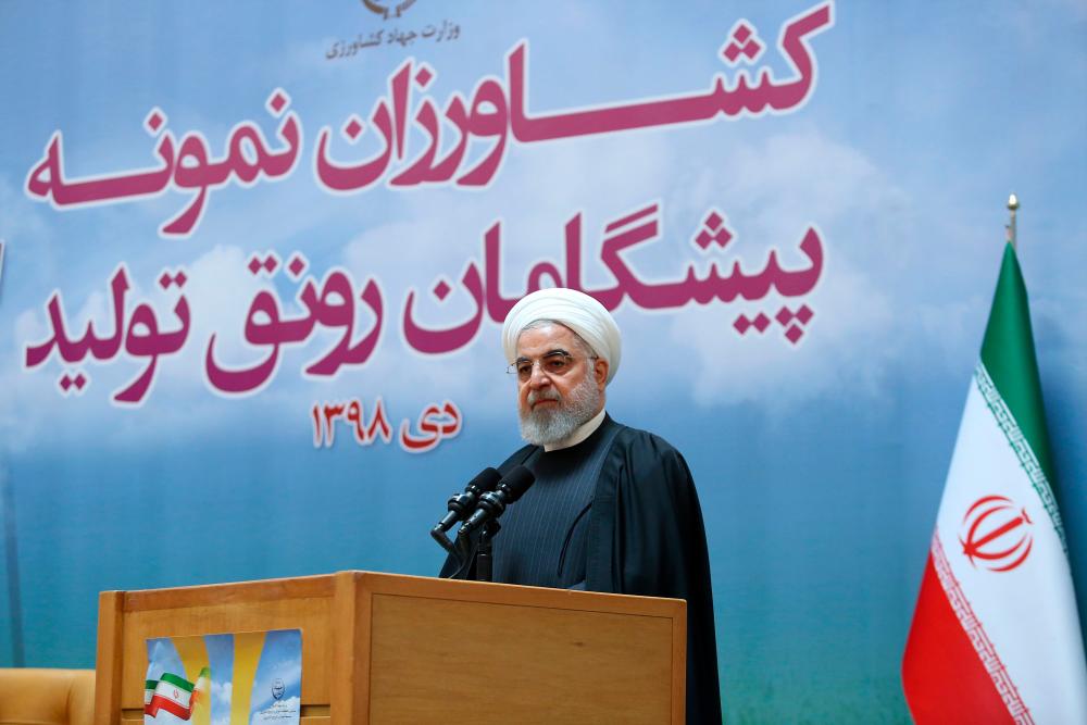A handout picture provided by the official website of the Iranian Presidency on January 14, 2020 shows President Hassan Rouhani speaking during a meeting with farmers in Tehran. - AFP