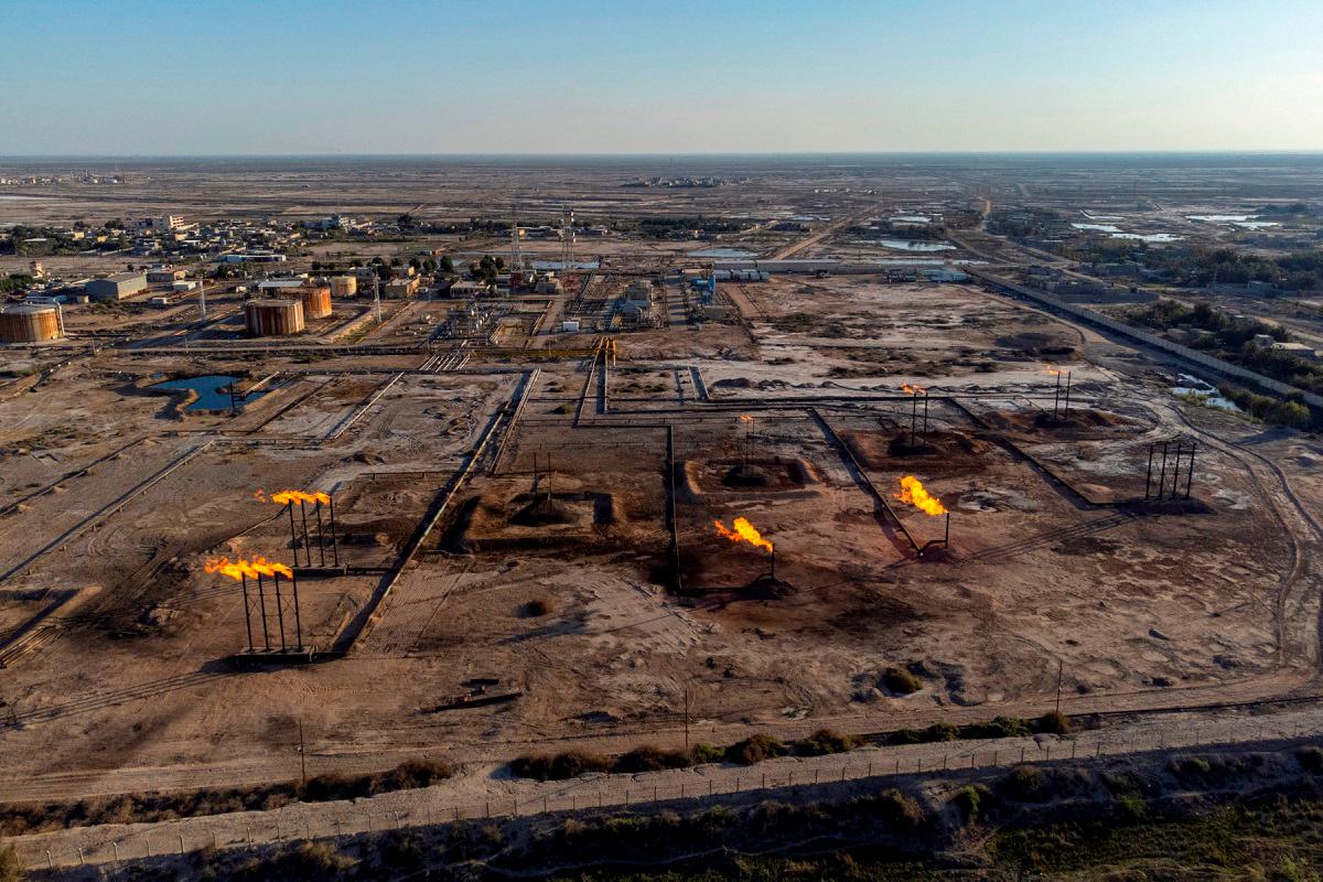 A picture taken on April 4, 2023 shows the Nahr Bin Omar oil field and facility near Iraq's southern port city of Basra. Major oil powers led by Saudi Arabia announced a surprise production cut of more than one million barrels per day on April 2, calling it a precautionary move aimed at stabilising the market. - Hussein FALEH / AFP