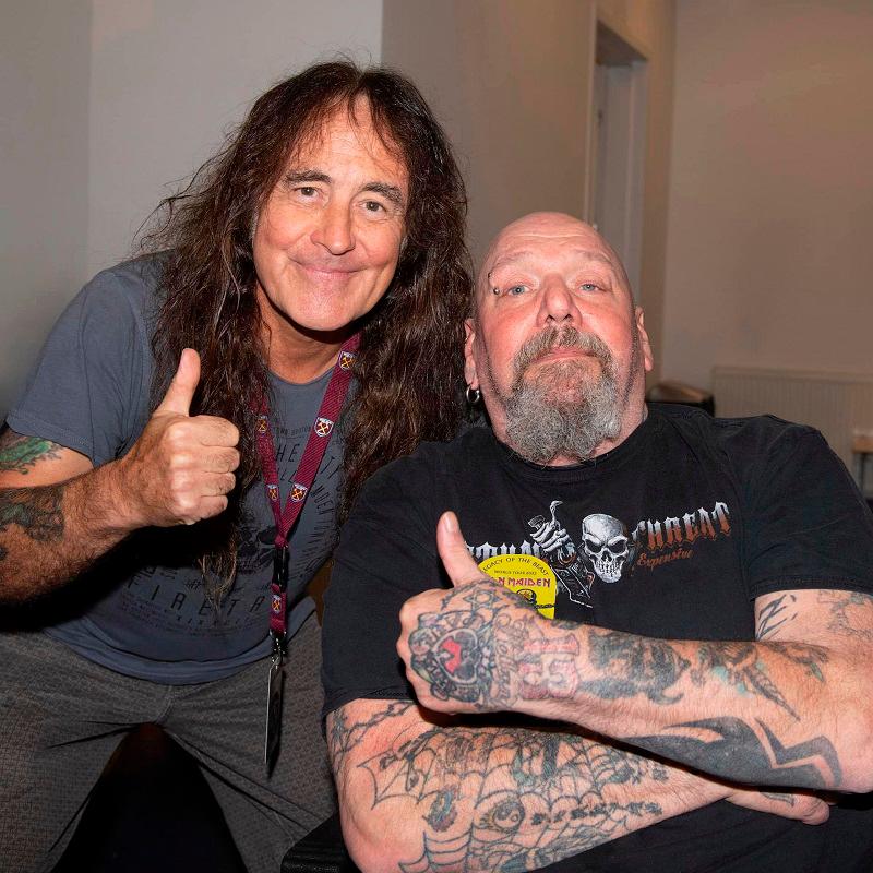 (From left) Harris with Di’Anno who was confined to a wheelchair in his later years but did not stop him from performing live. – PIC FROM FACEBOOK @ IRONMAIDEN