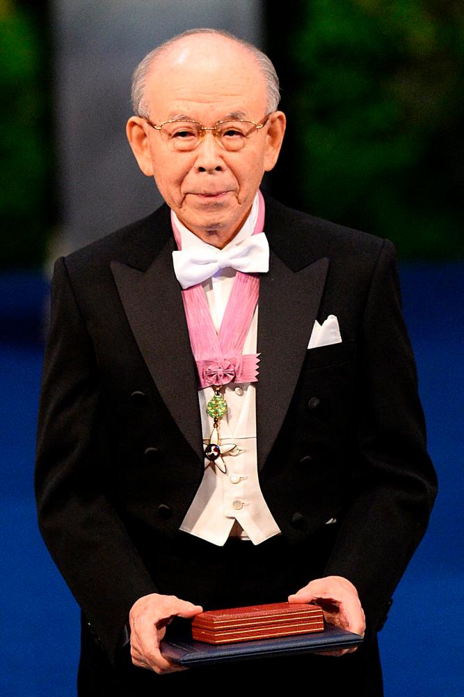 In this file photo taken on December 10, 2014, Nobel Physics laureate Isamu Akasaki of Nagoya University poses with the Nobel Prize during the 2014 Nobel prize award ceremony at the Stockholm Concert Hall in Stockholm. — AFP