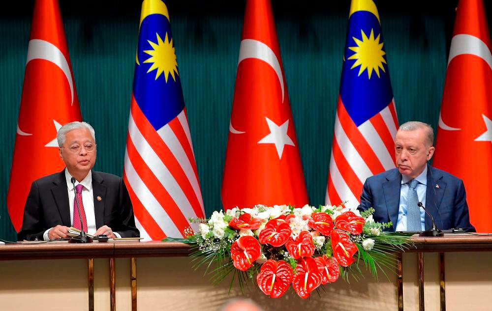 Malaysian Prime Minister Datuk Seri Ismail Sabri Yaakob with Turkish President Recep Tayyip Erdogan during a press conference at the Presidential Complex on July, 7 2022. BERNAMApix