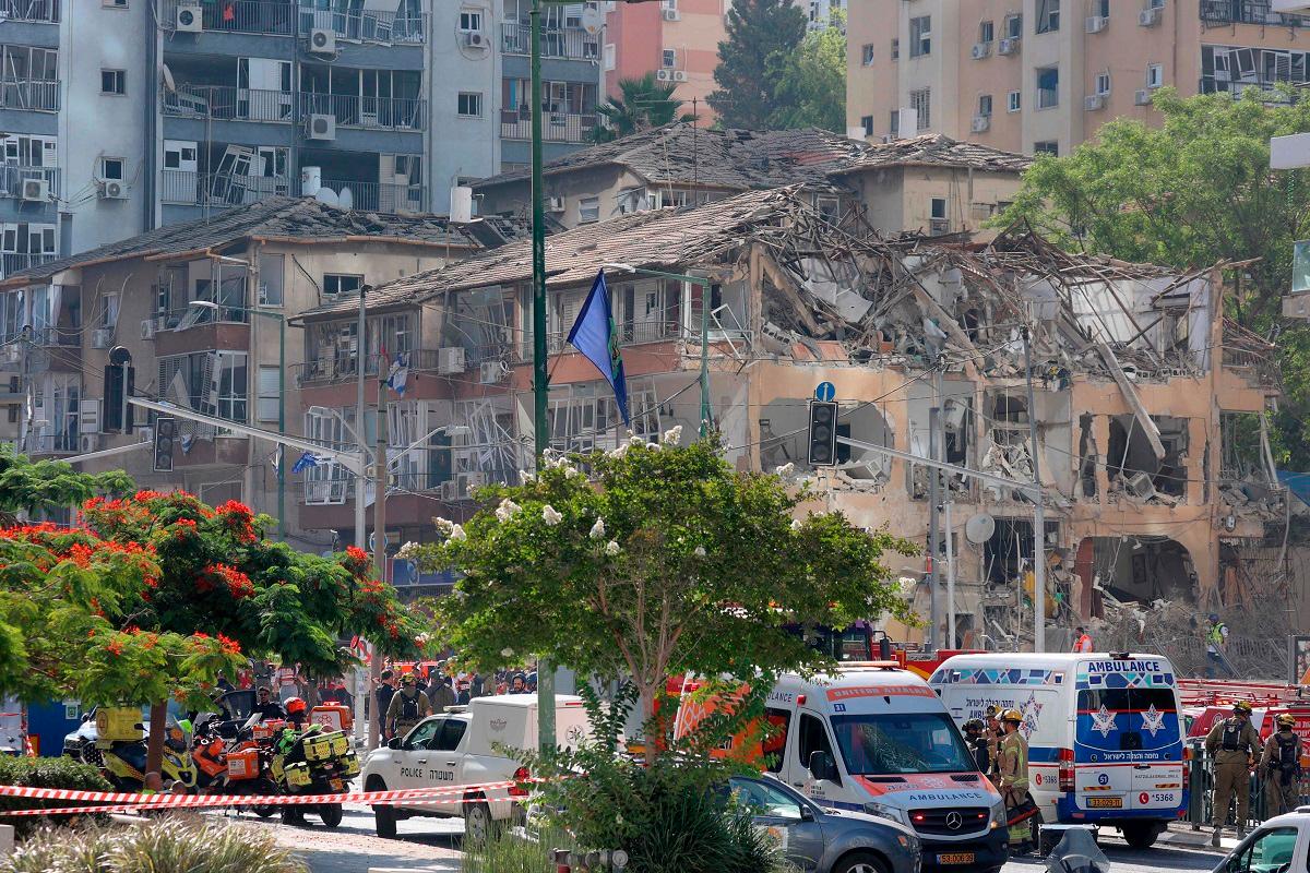 A destroyed building is pictured at the site of an Iranian missile attack in Ramat Gan in central Israel near Tel Aviv, on June 19, 2025. A hospital in southern Israel was hit during a barrage of “dozens” of Iranian missiles on June 19, officials said, while another impact was reported by emergency services in the Tel Aviv area. - GIL COHEN-MAGEN / AFP
