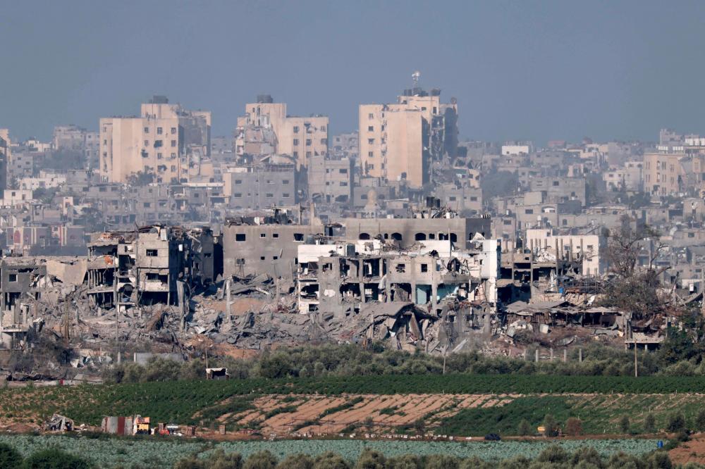 A picture taken from Israel’s southern city of Sderot shows destroyed buildings as a result of the Israeli bombardment of the northern Gaza Strip on October 30, 2023, amid ongoing battles between Israel and the Palestinian Hamas movement/AFPPix