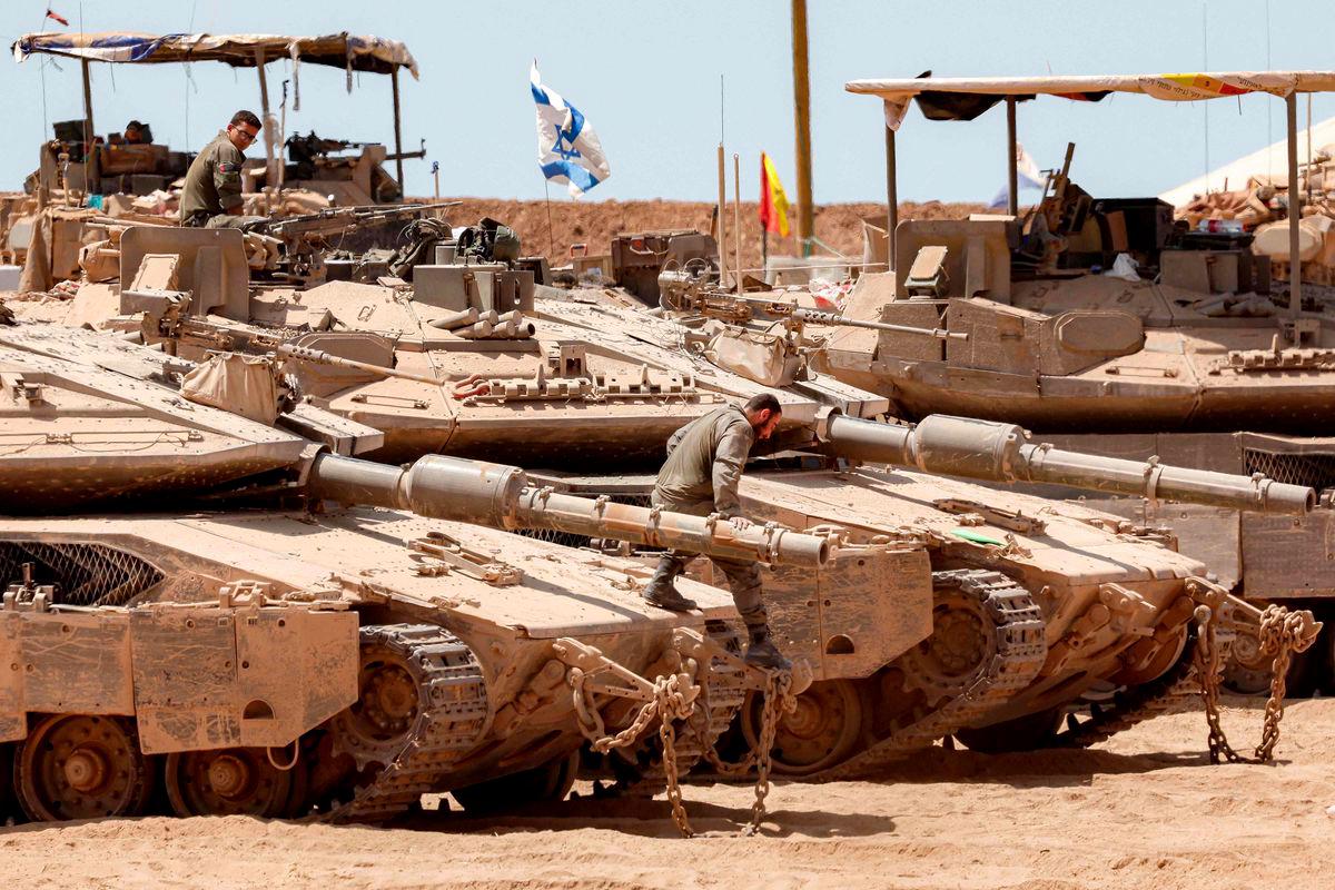 Israeli tanks are positioned along the border with the Gaza Strip on June 5, 2025, amid the ongoing war between Israel and Hamas. Gaza's civil defence agency said Israeli strikes killed at least 10 people in the battered Palestinian territory on June 5 as the military keeps up an intensified offensive. - AFPPIX