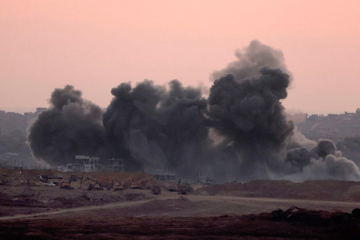 This picture taken from a position at Israel’s border with the Gaza Strip shows smoke billowing during an Israeli strike on the besieged Palestinian territory on July 8, 2025. (Photo by Jack GUEZ / AFP)
