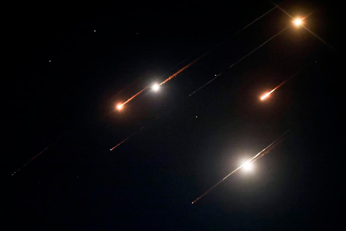 Missiles fired from Iran are pictured in the night sky over Nablus in the occupied West Bank on June 14, 2025. Israel and Iran exchanged fire on June 14, a day after Israel unleashed an unprecedented aerial bombing campaign that Iran said hit its nuclear facilities, “martyred” top commanders and killed dozens of civilians. AFPpix