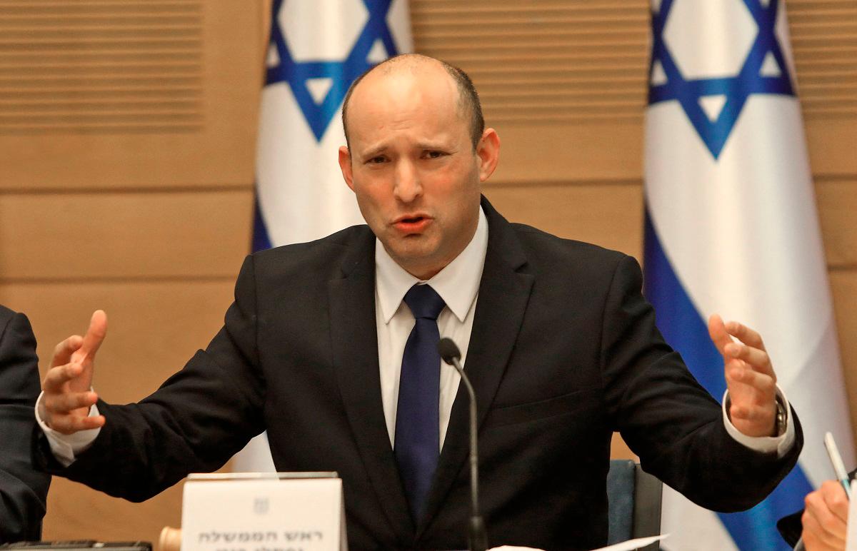 - Former Prime Minister Naftali Bennett gives an address at the Knesset in Jerusalem on June 13, 2021. / AFP / Gil COHEN-MAGEN