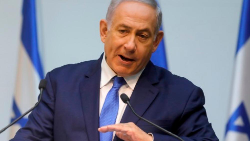 Israeli Prime Minister Benjamin Netanyahu addresses parliament in Jerusalem on Dec 19, 2018. — AFP