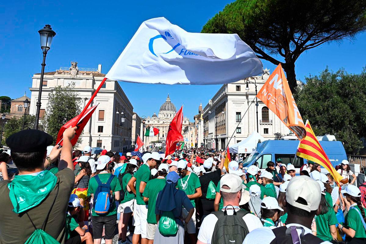 Young people, faithful and pilgrims wave flags as they gather to participate in the Jubilee of Youth in Rome on July 31, 2025. However, at least 1 million people are expected to attend the final Mass on August 3, 2025, with Pope Leo XIV in Rome’s Tor Vergata neighbourhood. AFPPix