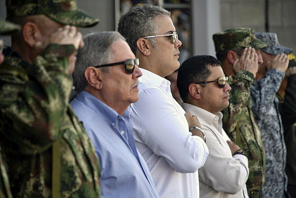 Colombian President Ivan Duque (C) and Colombian Defense Minister Guillermo Botero (2-L) launch the new national security and defense policy at the Tolemaida military fort in Cundinamarca department — AFP