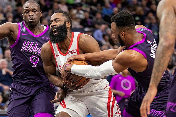 Houston Rockets guard James Harden (13) drives to the basket as Minnesota Timberwolves guard Josh Okogie (20) attempts to take the ball away in the first half at Target Center. — Reuters