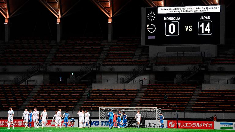 A general view shows the FIFA World Cup Qatar 2022 Asian zone group F qualification match between Japan (white) and Mongolia at Fuku-ari stadium in Chiba on March 30, 2021. – AFPPIX