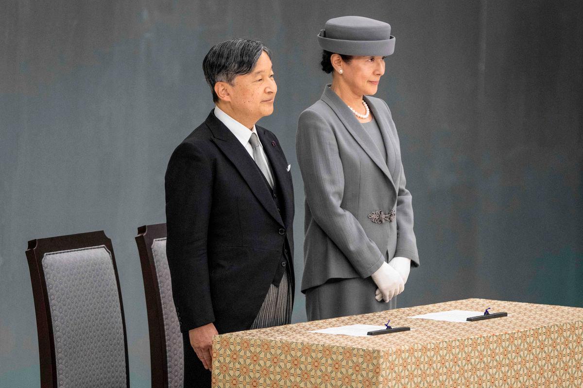 Japan’s Emperor Naruhito (L) and Empress Masako attend a memorial service marking the 80th anniversary of Japan’s surrender in World War II at the Nippon Budokan hall in Tokyo on August 15, 2025. (Photo by Yuichi YAMAZAKI / AFP)