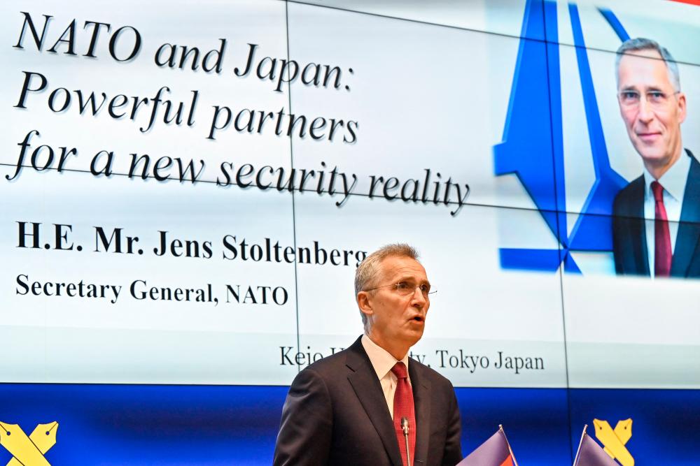 NATO Secretary General Jens Stoltenberg gives a speech during a visit to Keio University in Tokyo on February 1, 2023. AFPPIX