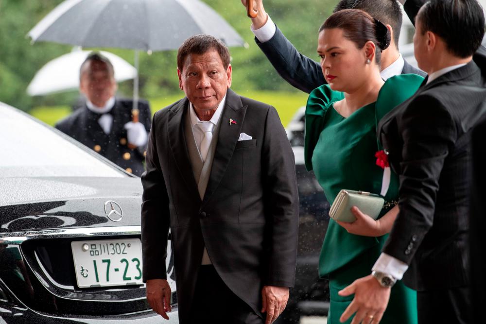 Philippines President Rodrigo Duterte arrives at the Imperial Palace to attend the proclamation ceremony of Japan's Emperor Naruhito's ascension to the throne in Tokyo on Oct 22, 2019. — AFP