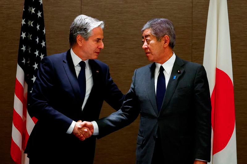 US Secretary of State Antony Blinken (L) shakes hands with Japanese Foreign Minister Takeshi Iwaya during a working lunch at a hotel in Tokyo on January 7, 2025. - AFPPIX