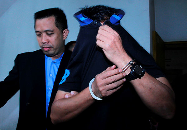 ASP Md Maizaili Mohamed, who is attached to the Malacca District Police Headquarters, is charged at the Johor Baru sessions’ court on April 11, 2019. — Bernama