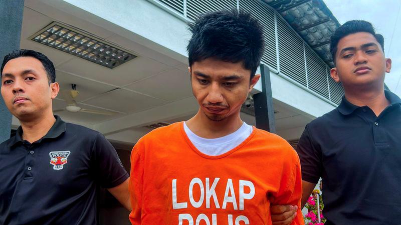 A farm worker was charged at the Magistrate’s Court here today with the murder of a woman, a mother of three, earlier this month. - fotoBERNAMA