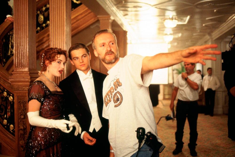 (from left) Kate Winslet, Leonardo DiCaprio and director James Cameron behind the scenes during the making of ‘Titanic’. – 20th Century Fox