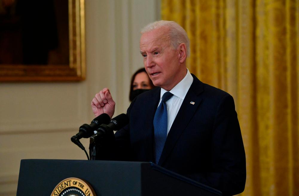 Middle East strife drags in reluctant Biden