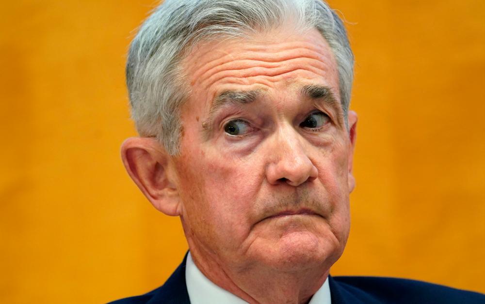 Powell reacting to introductory remarks before speaking on ‘Monetary Policy Challenges in a Global Economy’ during the international Monetary Fund’s annual research conference on ‘Global Interdependence’ in Washington on Thursday. – Reuterspic