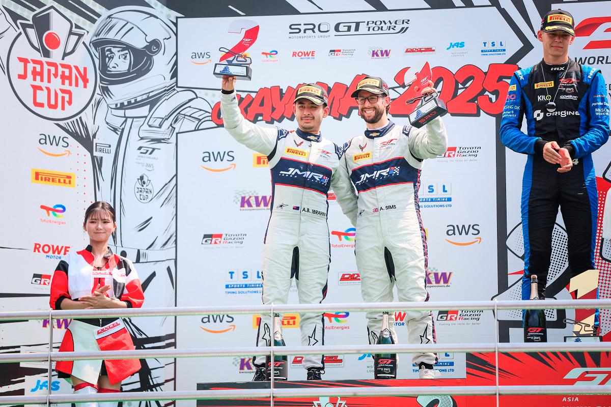 HH Prince Abu Bakar Ibrahim (left) and Alex Sims on the podium. – Hyperepublic