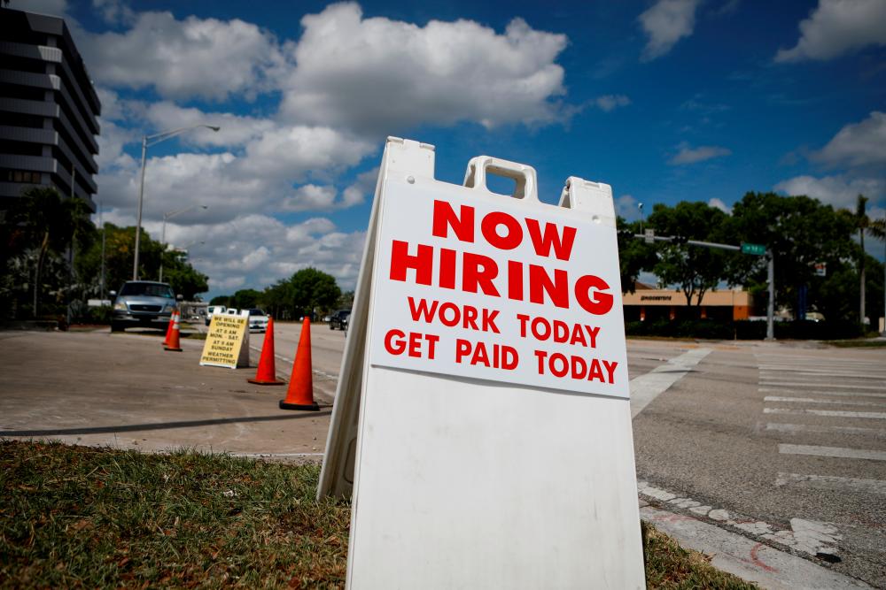 New US jobless benefits claims fall to pandemic low of 1.19 million