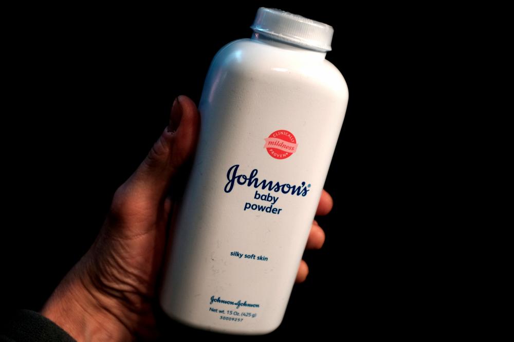 A bottle of Johnson and Johnson Baby Powder is seen in a photo illustration. – Reuterspix