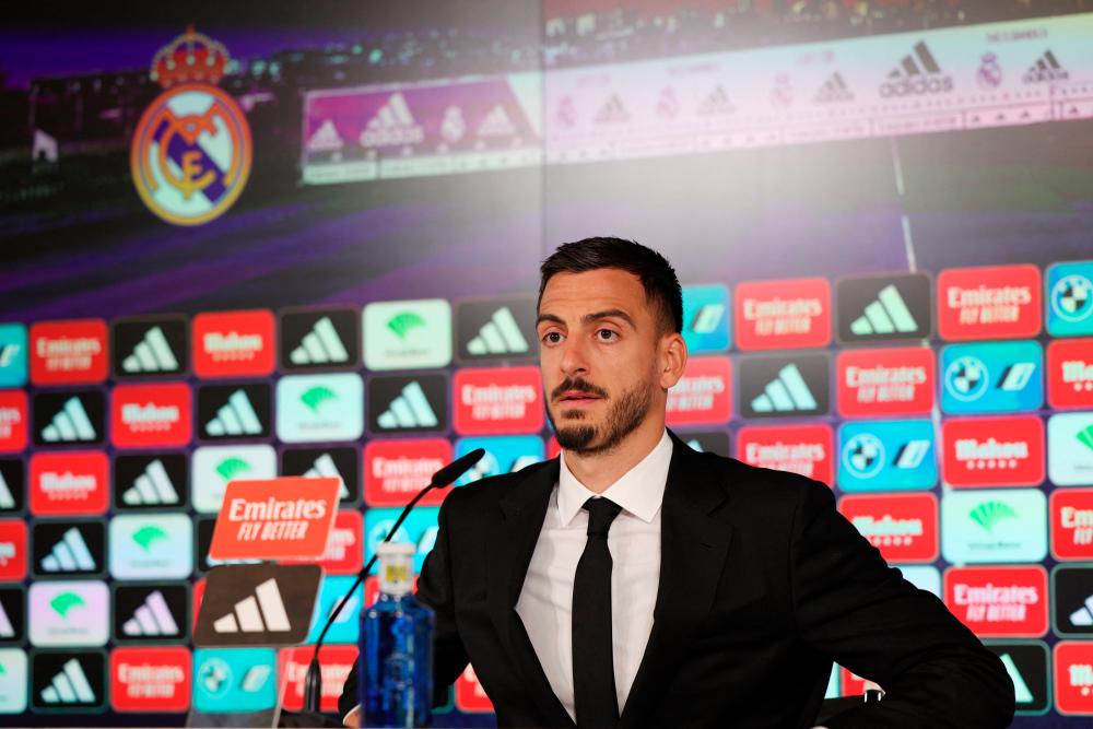 Real Madrid's new signing Joselu during a press conference. – REUTERSPIX