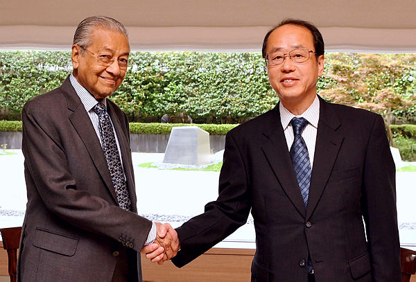 Prime Minister Tun Dr Mahathir Mohamad receives a courtesy call from the special advisor to the Prime Minister of Japan, Hiroto Izumi, today to discuss bilateral relations between Malaysia and Japan. — Bernama